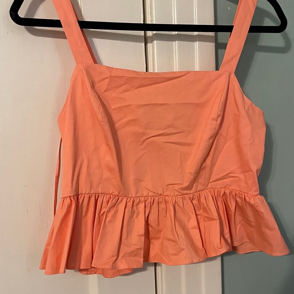 Peach Sleeveless Ruffle Hem Top